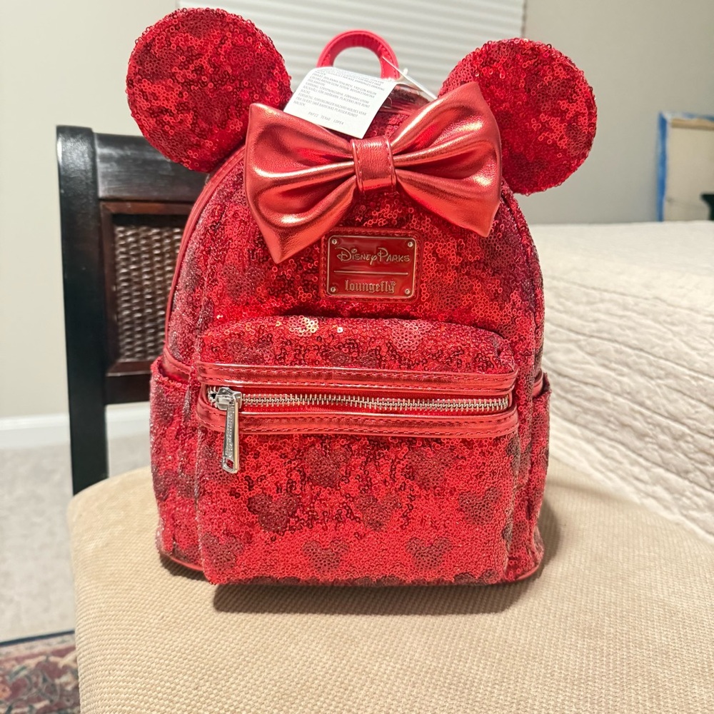 NWT. Loungefly Disney Minnie Mouse Red Sequin Loungefly Mini Backpack.